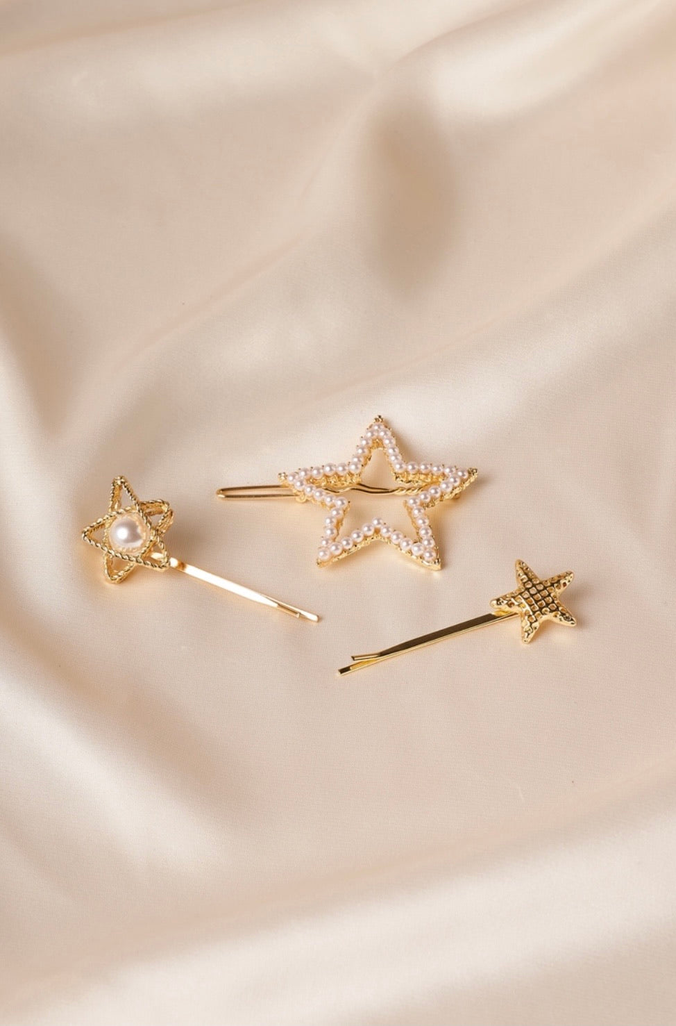 Gold Pearl star hair clips